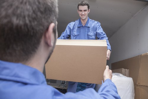 Man and van removal team loading items in Richmond upon Thames
