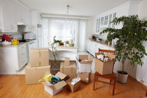 Careful loading of household items for transport in Richmond upon Thames