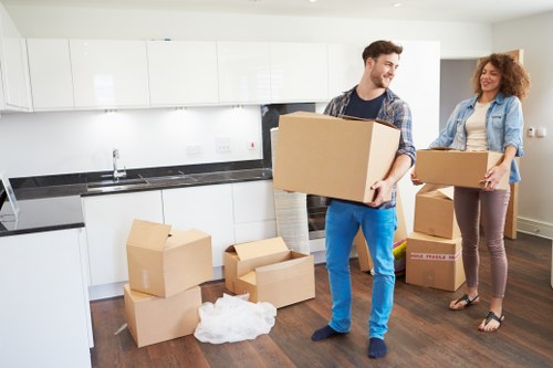 Office furniture being prepared for transport during a Richmond upon Thames move