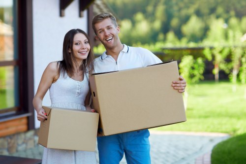 Packed moving boxes and household items ready for removal service