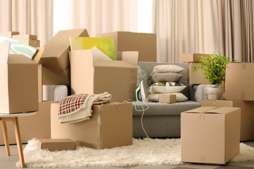 Packed moving boxes and furniture for a home move in Richmond upon Thames