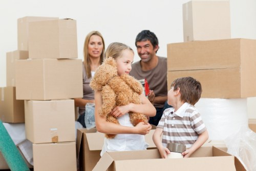 Professional movers handling furniture and boxes in Richmond upon Thames